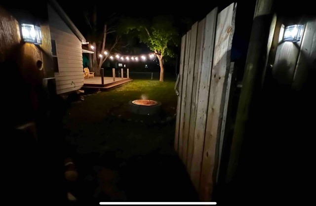 Quiet neighborhood, relaxing wrap around deck with fire pit. Short walk to town.