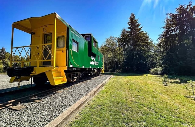 Railway Getaway Charming Caboose by Nature