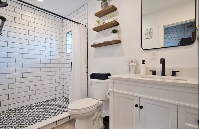 Rare Beautiful Beach Suite w/brand new bath & Private Entrance & patio!