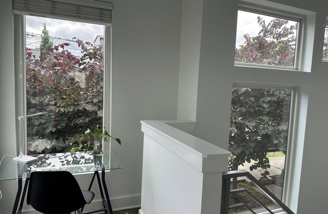 RARE FIND - 1 Bed 2 Bath Modern Private Oversized Garage City Skyline Views