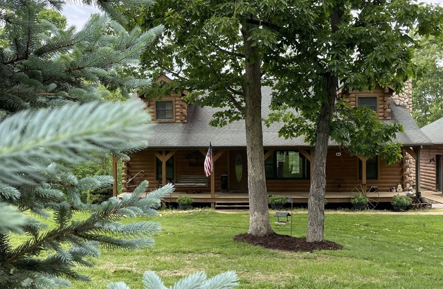 Real Log Cabin with Seasonal Pool and Hot Tub near Blue Springs Ranch