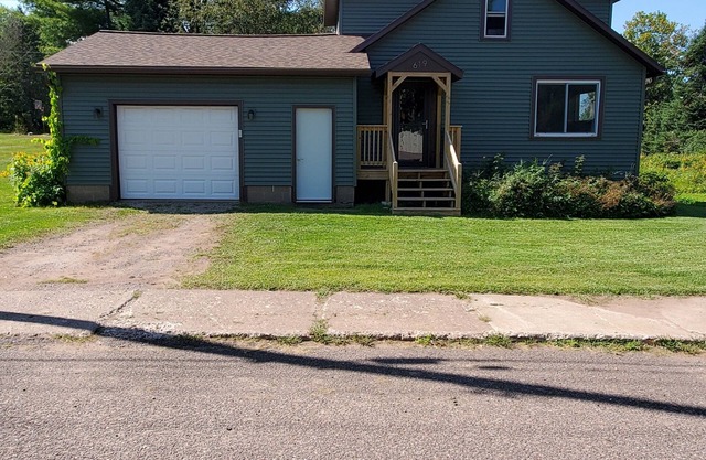 Recently remodeled home, across street from Michigan Snowmobile/ORV Trail #2!