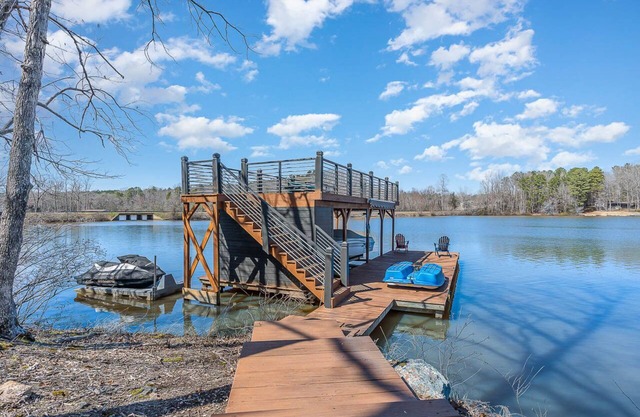 RECENTLY RENOVATED - 180-degree views, 2-story boathouse & OPTIONAL BOAT RENTALS