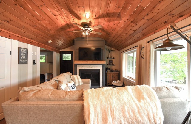 Recently updated home on Thompson Lake with gorgeous sandy beach!