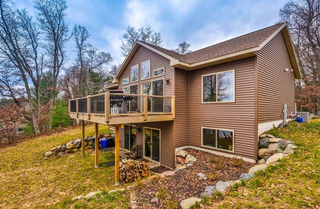 Recreational lakefront home w/ private dock, trails access, & washer/dryer