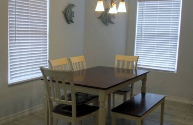 Red Fish Condo A, with boat slips and pool.