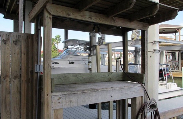 Red Fish Condo B, with boat slips and pool.