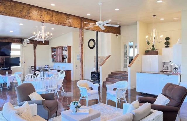 Red Roof Farmhouse has beds for 27, a 12 person swim spa, 1350 sq ft activity rm
