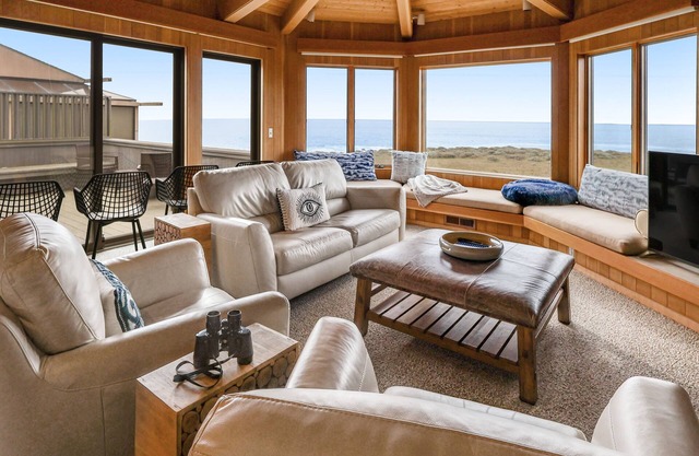 Rejuvenating seaside home with balcony, wood fireplace, & community amenities