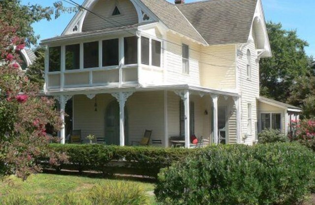 Relax and experience Cape May Point in this Carpenter Gothic cottage