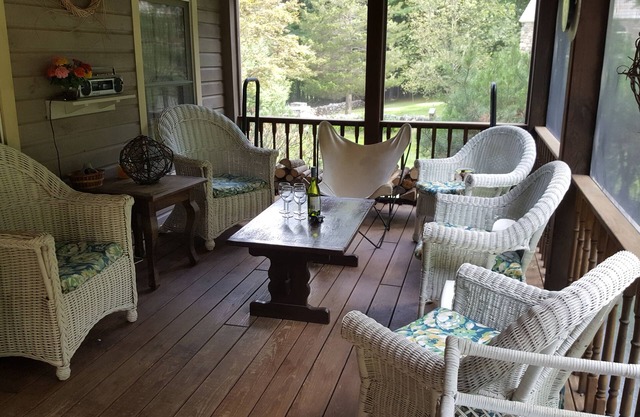 Relax and unwind - 4 bedrooms, 2 full baths, screened in porch & yard for kids.