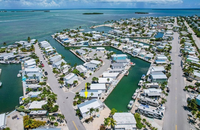 Relax at Keys Time – 2BR Waterfront Rental w/ Kayaks, Bikes, and Boat Dock