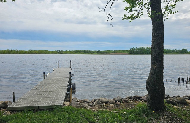 Relax in 3 bed, 2 bath house on quiet 2 acres with private lake.