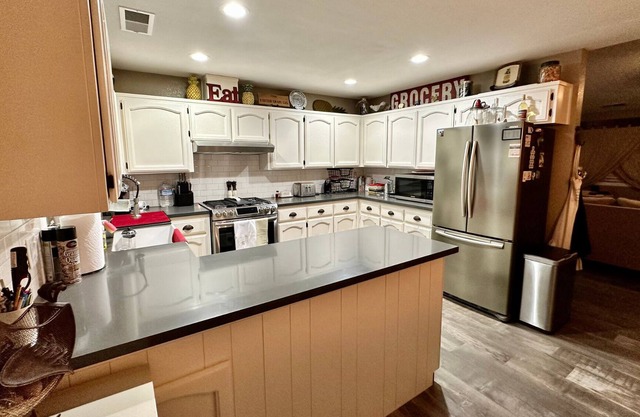 Relax in Exeter at a 2 bedroom 1 bath Oasis with a large covered patio and Pool