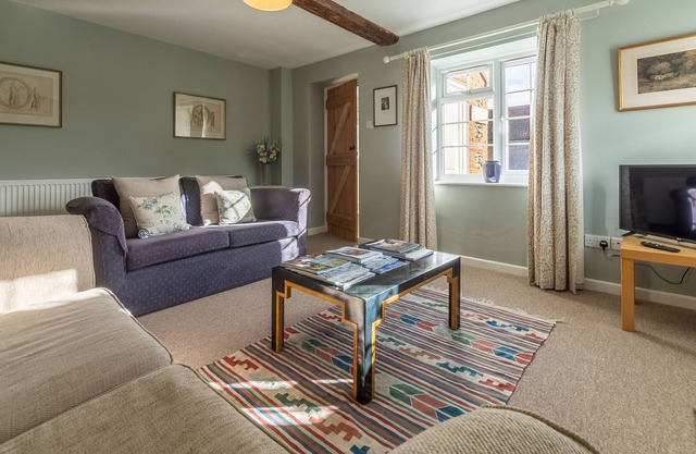 Relax in this handsome brick and pantile cottage, set within the grounds of the owner's estate in th