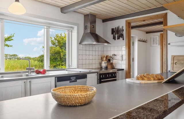 Relax in this spacious cottage surrounded by idyllic nature.