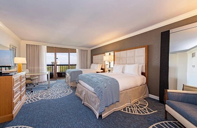 Relax in Three Relaxing Rooms with Balcony, Beach & Outdoor Pool Access