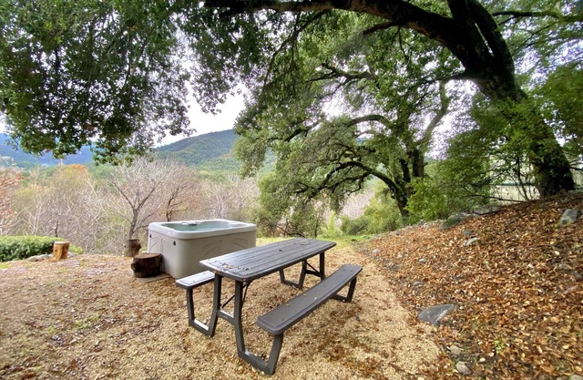 Relax to the Sound of the River while you soak in a Private Hot Tub