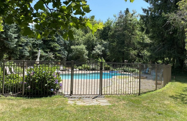 Relaxation Awaits-Fully renovated home heated pool, private manicured grounds.