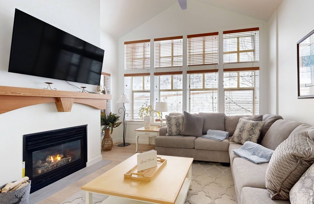 Relaxing mountain-view condo with shared hot tub, pool & more-walk to ski lifts