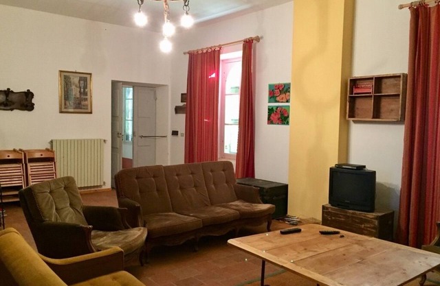 Remodeled farmhouse next to medieval castle in Brozolo, Piedmont, Italy