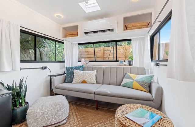 Renovated 1970’s retro camper on Bayou Grande in Pensacola with walking trail.