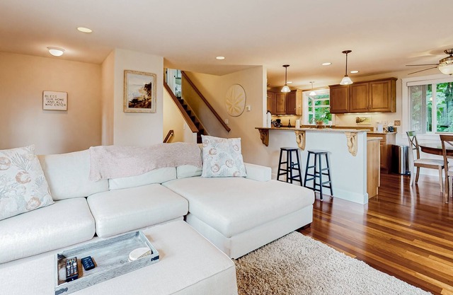 Renovated home in a forest glen with fantastic deck & fireplace - walk to beach