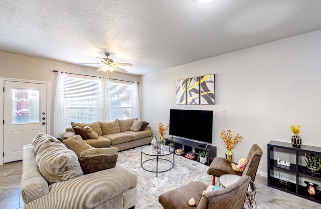 Renovated townhome with private yard, central AC, & private W/D