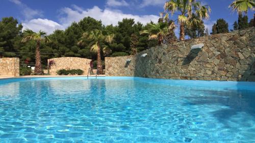 RESIDENCE ELEGANCE ville ed appartamenti a Porto Pino