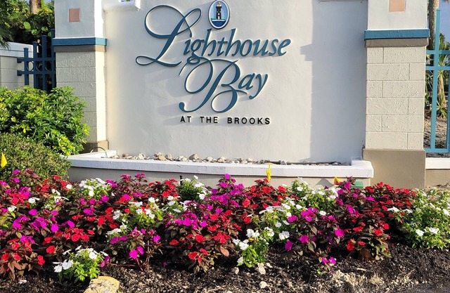 Resort living-6 pools, tennis, boche and more! Lakefront unit!