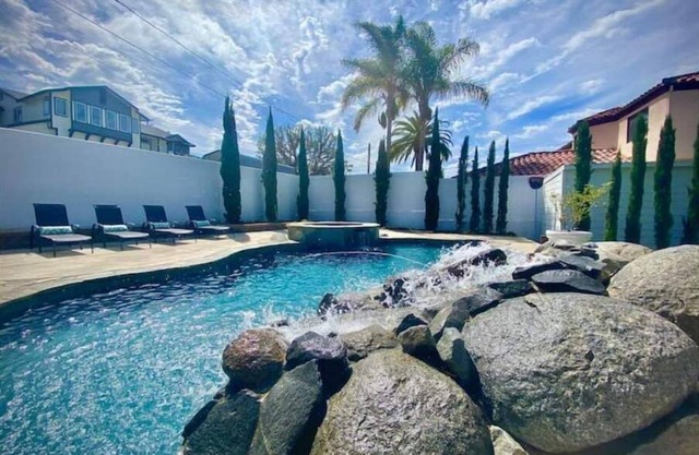 Resort Style Home with Hot Jacuzzi, Relaxing Pool and Cozy Living Spaces