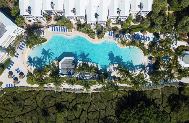 Resort-Style Living at Mariner's Club – Steps from Pools, Marina, & Ocean Views!