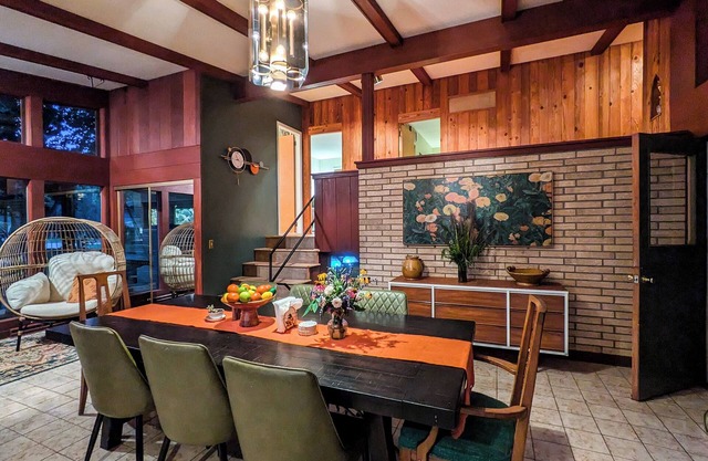 Retro lakeview stay with hot tub, game room, and nearby golf and skiing.