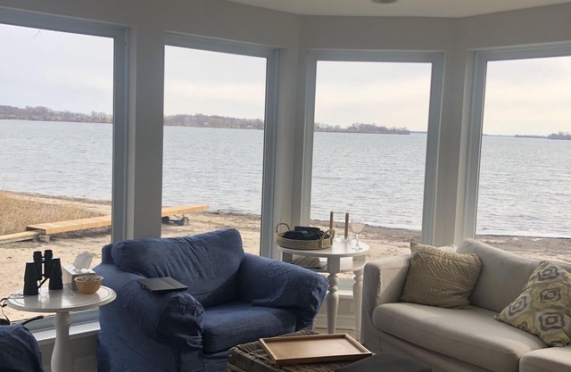 Revel at this lovely private beach house on the lake :--)