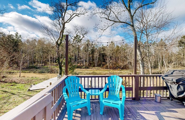 Riverfront home near Gulf beaches with private deck & scenic dock