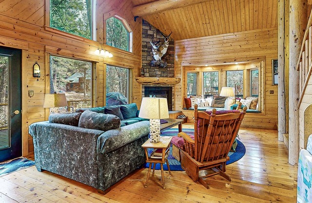 Riverfront home with deck, fireplace, & salt water hot tub- near hiking & lake