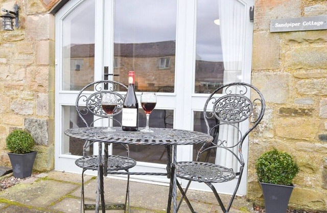 Cottage-Eigenes Badezimmer-Hütte-Blick auf den Hof