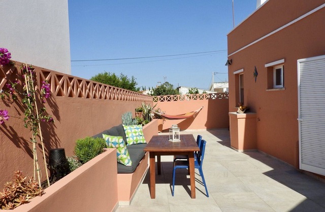 Romantic village house with spacious roof terrace and patio