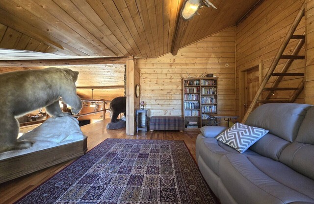 Room 2 at the Main Lodge with a queen bed and single bed.