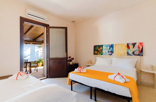 Zimmer 'Arancio' mit privater Terrasse, Wi-Fi und Klimaanlage