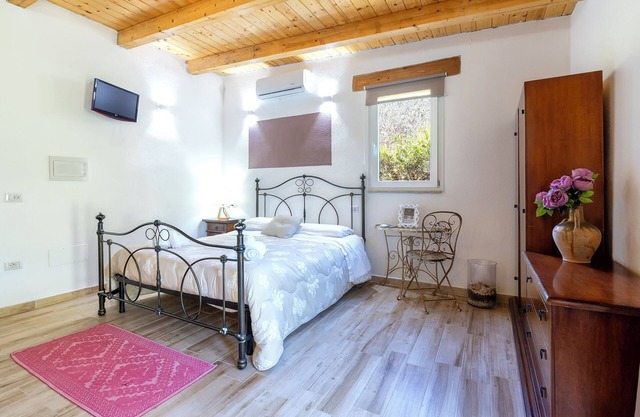 Zimmer 'Country Suite' mit Gemeinschaftspool, gemeinsamer Terrasse und Klimaanlage
