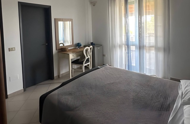 Zimmer 'Margherita 5' mit privater Terrasse, Wi-Fi und Klimaanlage