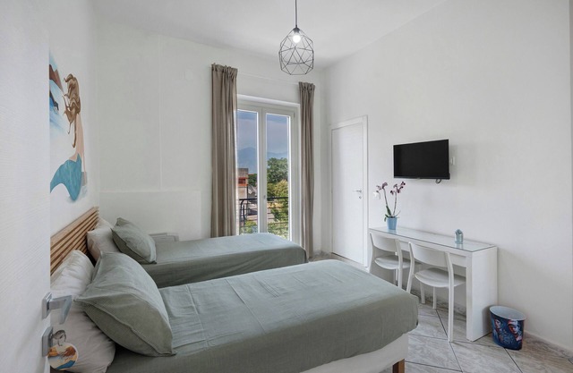 Zimmer 'Napoli' mit gemeinsamer Terrasse, Wi-Fi und Klimaanlage