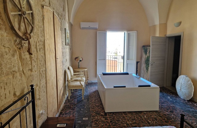 Zimmer 'Palazzo Costantini - Anturium' mit Gemeinschaftsterrasse, Wi-Fi und Klimaanlage