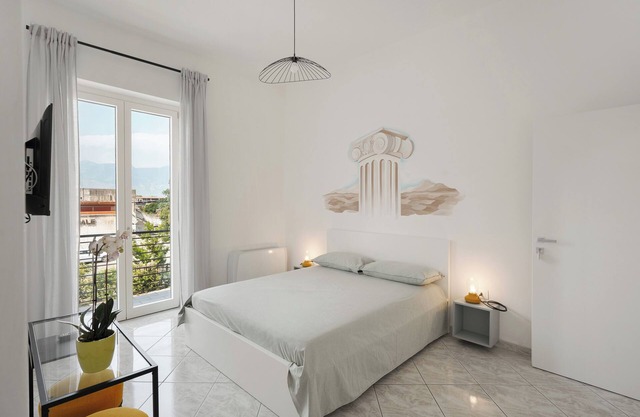 Zimmer 'Pompei' mit gemeinsamer Terrasse, Wi-Fi und Klimaanlage