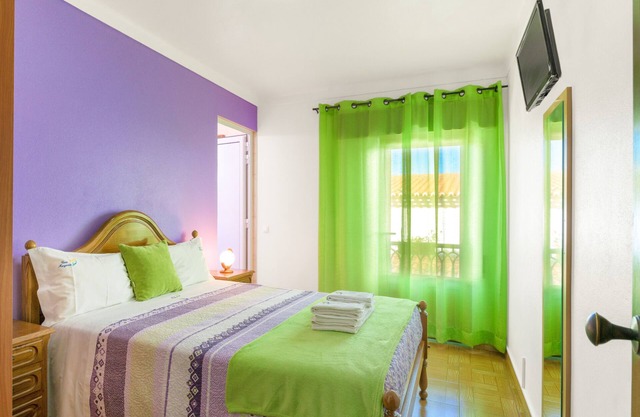 Zimmer 'Quarto Lilás' mit Balkon und Wi-Fi