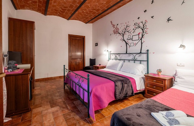 Zimmer 'Rosa' mit Gemeinschaftspool und Gemeinschaftsgarten