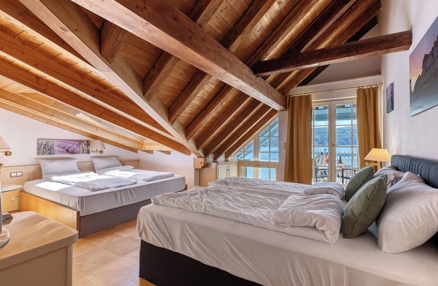 Suite - Vierbettzimmer mit Seeblick und Balkon