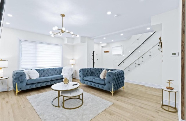 Room with working space and queen bed in a Old mills luxury house