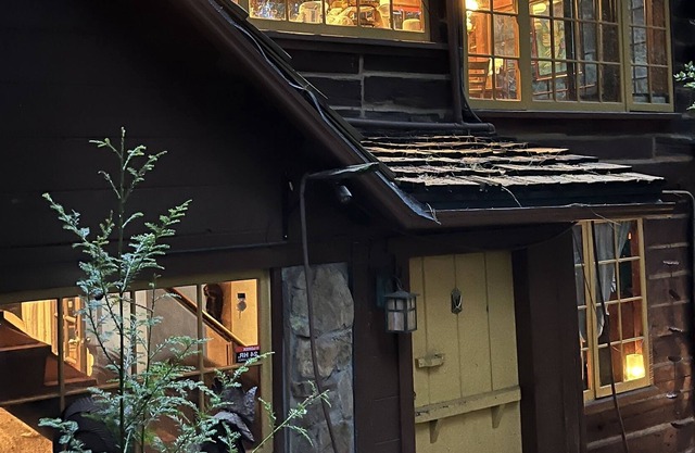 Rooms/tents in quaint original log cabin nestled in the Redwood trees on creek.